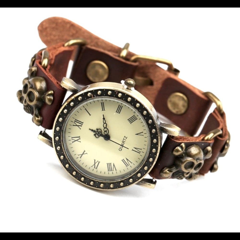 SOLD. Ladies watch, leather with skulls.